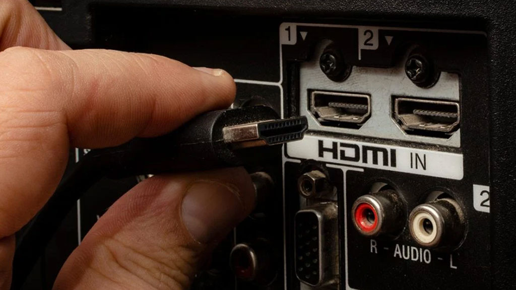 Connectiques HDMI et SDI sur panneau arrière de caméscope broadcast professionnel